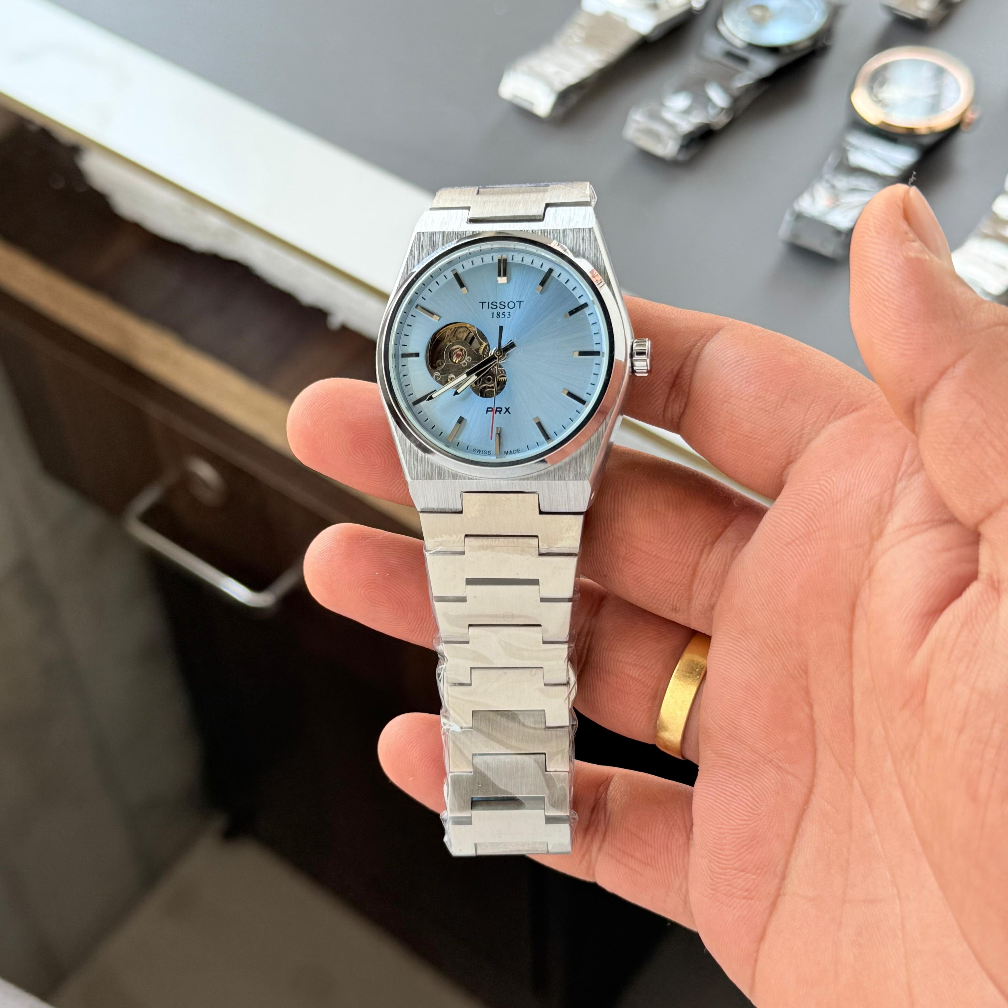 TISSOT PRX Automatic Sky blue (Open Heart)